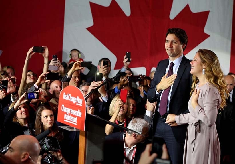 Liberal Party leader Justin Trudeau is accompanied by his wife Sophie Gregoire as he arrives to give his victory speech after Canada's federal election in Montreal, Quebec, October 19, 2015. (Christinne Muschi/Reuters)