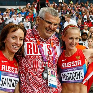 epa05018117 (FILE) A file picture dated 11 August 2012 of Mariya Savinova (L) and Ekaterina Poistogova (R) of Russia celebrate with Russian coach Vladimir Kazarin after placing first and third respectively in the women's 800m final at the London 2012 Olympic Games Athletics, Track and Field events at the Olympic Stadium, London, Britain. Both athletes are among the five Russian runners targeted for a lifetime ban recommended by an independent World Anti-Doping Agency (WADA) commission that on 09 November 2015 urged the athletics governing body IAAF to suspend Russia from competition as it reported on its investigation into systematic doping in the country.  EPA/KERIM OKTEN