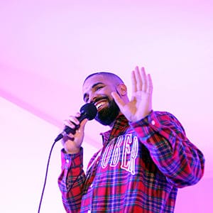 Toronto Rapper Drake addresses media in a 'Hotline Bling' installation at the Air Canada Centre in Toronto on November 25, 2015, prior to a Toronto Raptors vs. Cleveland Cavaliers NBA game. (Cole Burston/Toronto Star via Getty Images)