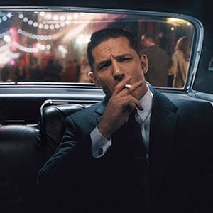 (L to R) Reggie and Ronnie Kray (TOM HARDY) in Legend. From Academy Award winner Brian Helgeland (L.A. Confidential, Mystic River) and Working Title comes the true story of the rise and fall of London's most notorious gangsters, both portrayed by Hardy in a powerhouse double performance.  (Universal Pictures)
