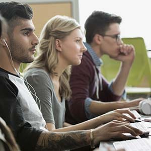 College students working in computer lab. (Hero Images/Getty Images)