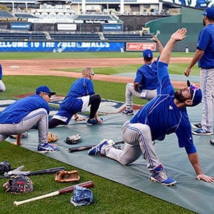 KANSAS CITY, MO - OCTOBER 23:  Jose Bautista #19 of the Toronto Blue Jays stretches prior to Game 6 of the ALCS against the Kansas City Royals at Kauffman Stadium on Friday, October 23, 2015 in Kansas City Missouri. (LG Patterson/MLB Photos/Getty Images)