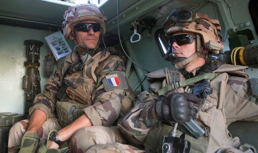 French soldiers from Operation Barkhane patrol in Timbuktu, November 5, 2014. REUTERS/Joe Penney 