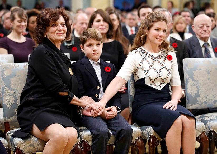 Justin Trudeau's wife Sophie Gregoire (R), son Xavier and mother Margaret (L) hold hands before he is sworn-in as Canada's 23rd prime minister during a ceremony at Rideau Hall in Ottawa November 4, 2015.  (Chris Wattie/Reuters)