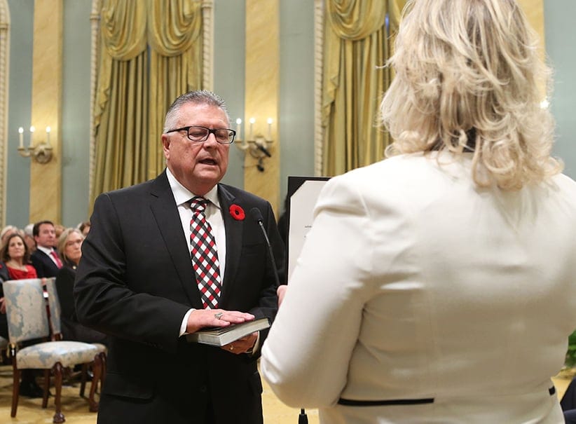 Canada's new Public Safety and Emergency Preparedness Minister Ralph Goodale (L) is sworn-in during a ceremony at Rideau Hall in Ottawa November 4, 2015. (Chris Wattie/Reuters)