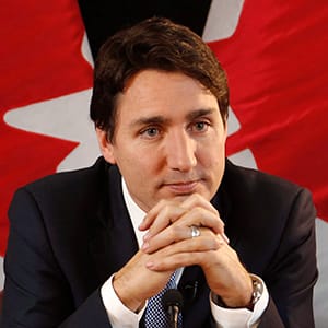Prime Minister Justin Trudeau speaks with reporters during an interview with The Canadian Press in Ottawa on Wednesday, December 16, 2015. (Patrick Doyle/CP)