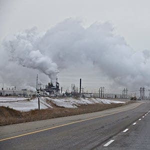 A work truck drive to the Syncrude plant in Fort McMurray Alberta, November 14, 2015. (Photograph by Jason Franson)