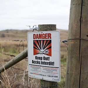 A warning sign on the Goose Lake Range in Vernon B.C. , October 27, 2015. Many unexploded explosive ordnance are still on the range which is owned by the Okanagan Indian Band Reserve. (Photograph by Jason Franson)