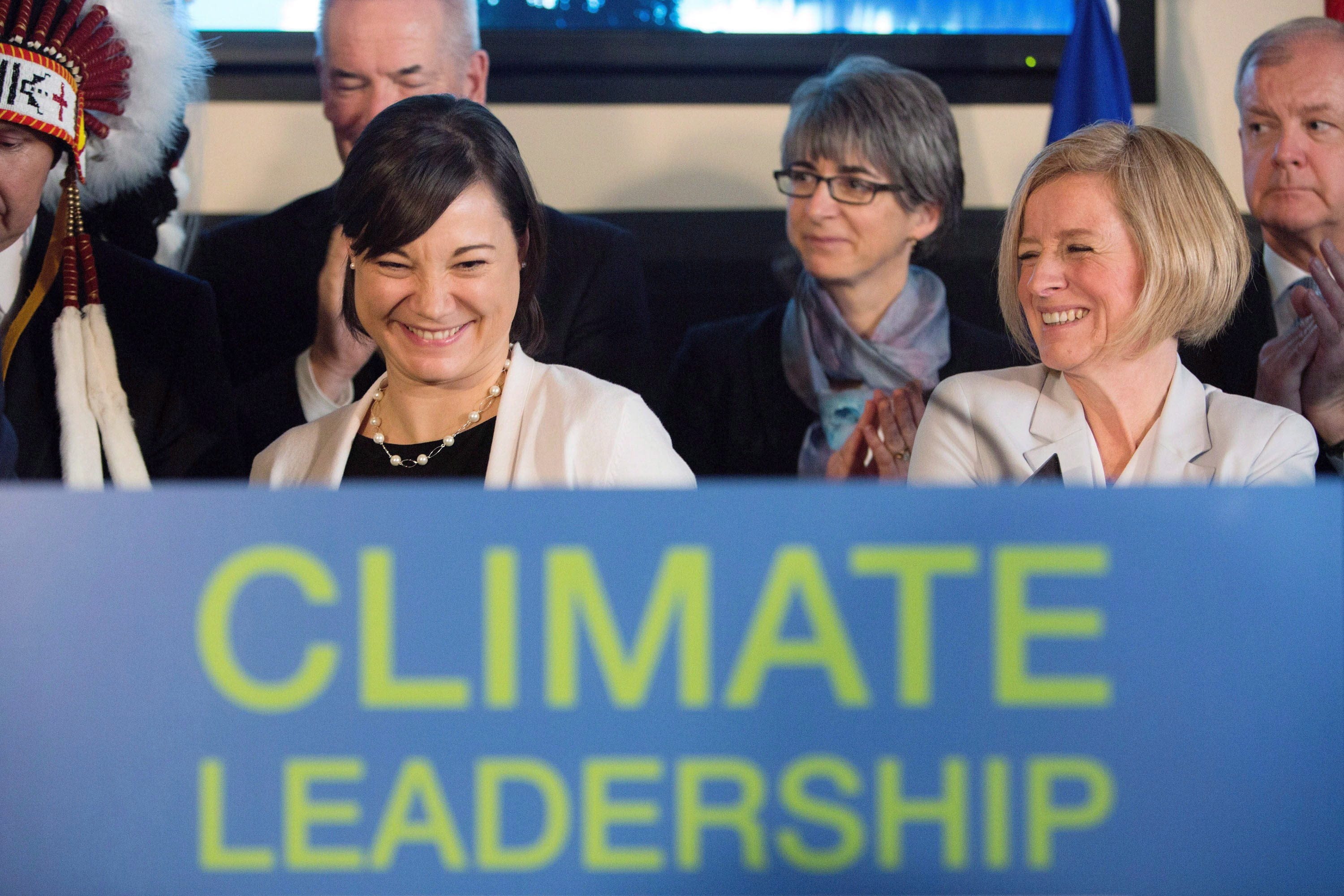 Premier Rachel Notley, right, and Environment and Parks Minister Shannon Phillips look on after unveiling Alberta's climate strategy in Edmonton, Alberta, on Sunday, November 22, 2015.Climate isn't all that's changing in Alberta.The province's NDP government has arguably made bigger moves on global warming in six months than the previous Conservatives made in a generation. THE CANADIAN PRESS/Amber Bracken