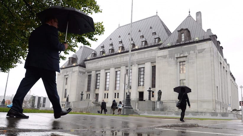 The Supreme Court of Canada building is pictured, in Ottawa, on October 15, 2014. The Trudeau government appears to be in no hurry to grapple with the explosive issue of doctor-assisted dying, even as it prepares to urge the Supreme Court next week to give it more time to craft a new law on the matter. THE CANADIAN PRESS/Sean Kilpatrick