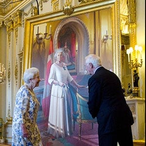 Queen Elizabeth talks with Governor General David Johnston as she unveils a portrait of herself in the White Drawing Room at Buckingham Palace in London on Wednesday, June 6, 2012. The portrait was painted by Canadian artist Phil Richards. (Sean Kilpatrick/CP)