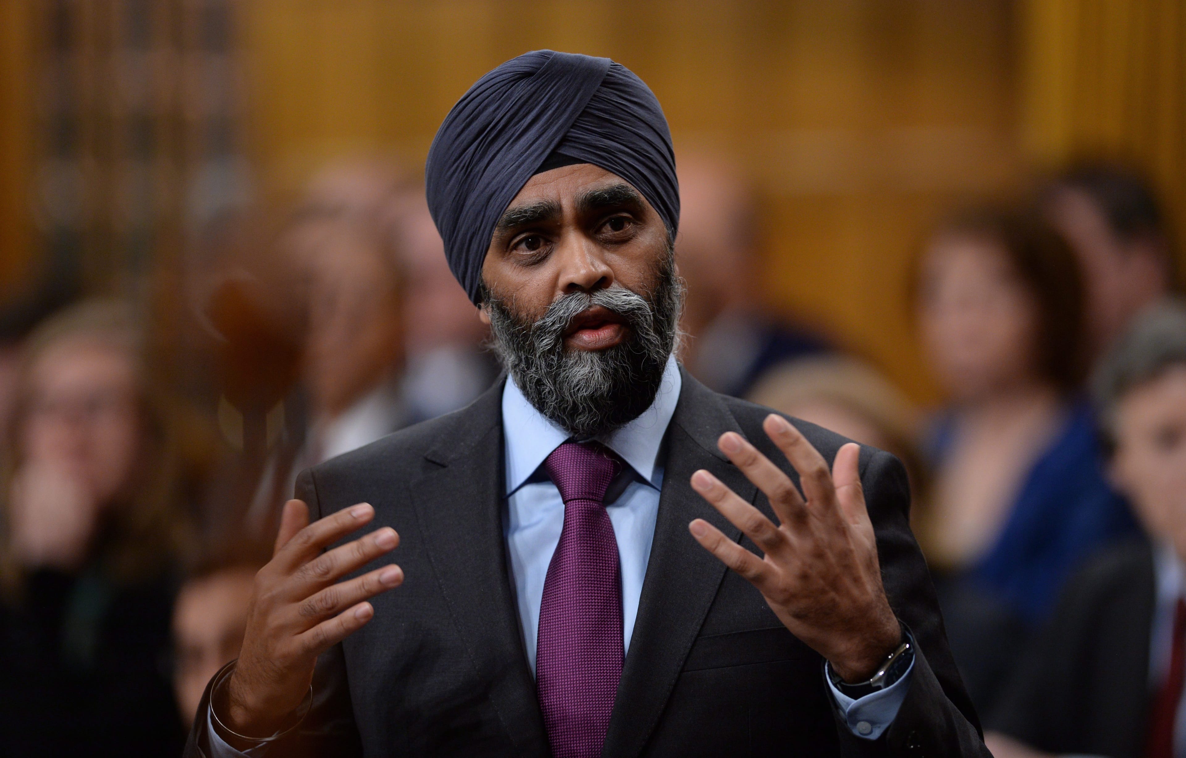 Minister of National Defence Minister Harjit Singh Sajjan responds to a question during question period in the House of Commons on Parliament Hill in Ottawa on Tuesday, Feb. 16, 2016. THE CANADIAN PRESS/Sean Kilpatrick