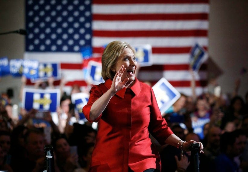 Democratic presidential candidate Hillary Clinton takes the stage during a Nevada Democratic caucus rally, Saturday, Feb. 20, 2016, in Las Vegas. (AP Photo/John Locher)