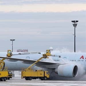 Air Canada planes get de-iced on the tarmac by crews at Pearson International Airport in Toronto. Toronto is back under a cold weather alert, causing yet more flight delays and travel havoc. January 20, 2014. (Rene Johnston/Toronto Star/Getty Images)