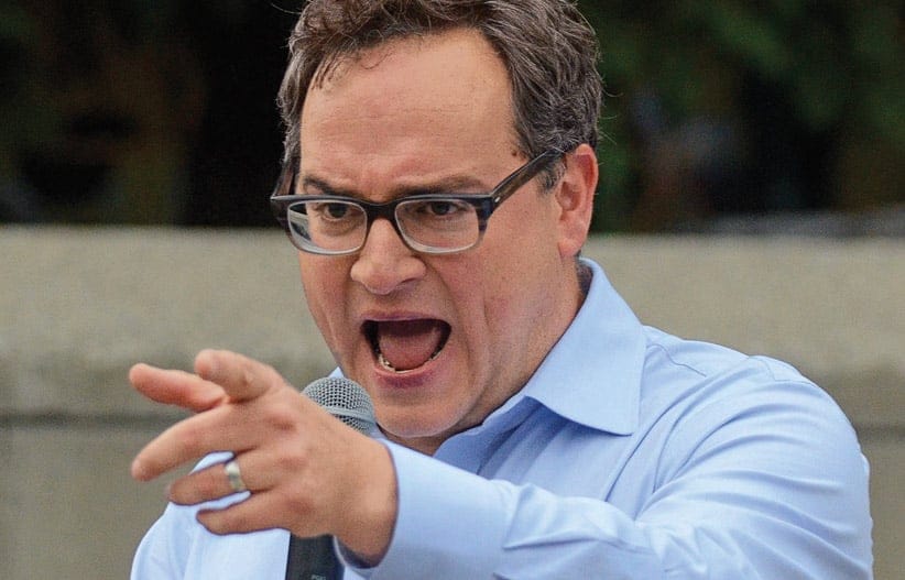 Sun News Network columnist and host of The Source, Ezra Levant speaks to a crowd of  a few hundred at a Calgary for Israel rally at city hall in downtown Calgary, Alta. on Thursday July 31, 2014. The event was being held to show solidarity with the Israeli people while condemning pro-Palestinian supporters who attacked members of a Jewish family during what he called a pro-Hamas rally two weeks ago. Stuart Dryden/Calgary Sun/QMI Agency