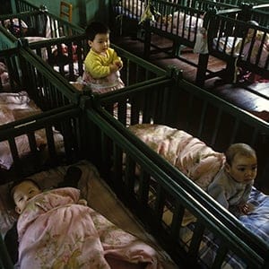 CHINA - MARCH 11:  A Chinese child at orphanage in Shangai, China on March 11, 1994.  (Raphael Gaillarde/Gamma-Rapho/Getty Images)