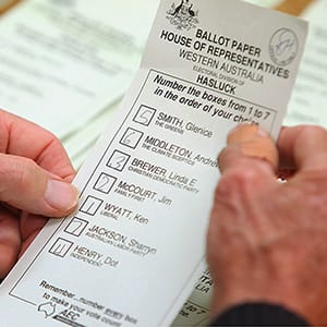 PERTH, AUSTRALIA - AUGUST 25: A ballot paper is scrutinised as the counting of absentee and postal votes for the marginal seat of Hasluck in Western Australia begins on August 25, 2010 in Perth, Australia. The 4,500 postal votes are considered key for the WA seat as Liberal Party candidate Ken Wyatt currently leads incumbent Australian Labor Party candidate Sharryn Jackson by less than 400 votes as Australia waits for a result in the hung Parliament situation following the Federal Election on August 21.  (Paul Kane/Getty Images)