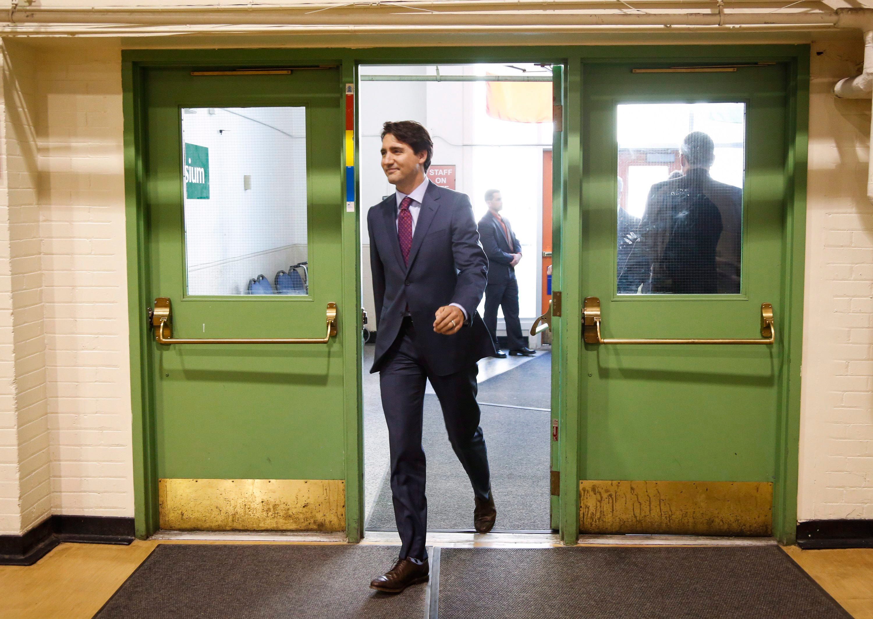 Prime Minister Justin Trudeau arrives to speak to the media after participating in a roundtable discussion on employment insurance in Calgary, Alta., Tuesday, March 29, 2016. (Jeff McIntosh/CP)