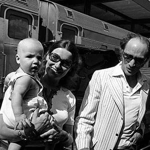 Seven-month-old Justin Trudeau looks around impatiently in his mothers arms as Prime Minister and Mrs. Trudeau prepare to board the train Wednesday July 20, 1972 for a summer vacation on the west coast. (Peter Bregg/CP)