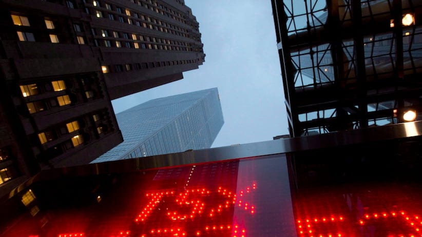 A tote board displays the closing figure for the TSX in Toronto THE CANADIAN PRESS