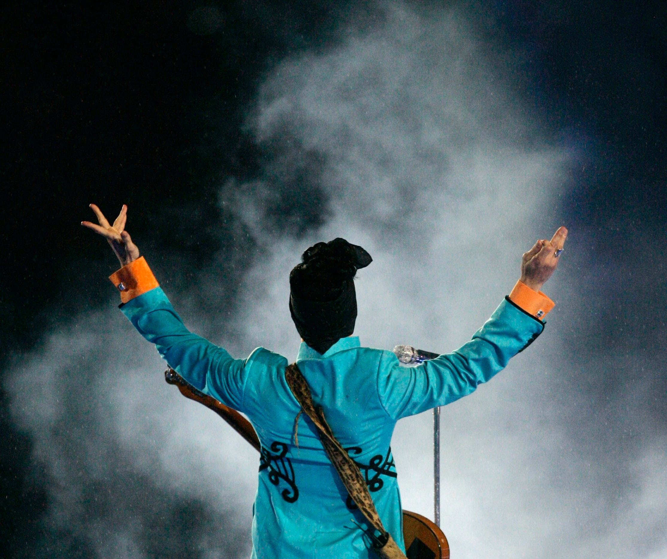 In this Feb. 4, 2007 file photo, Prince performs during the halftime show at Super Bowl XLI at Dolphin Stadium in Miami. Prince's publicist has confirmed that Prince died at his home in Minnesota, Thursday, April 21, 2016. He was 57. (AP Photo/Chris Carlson, File)