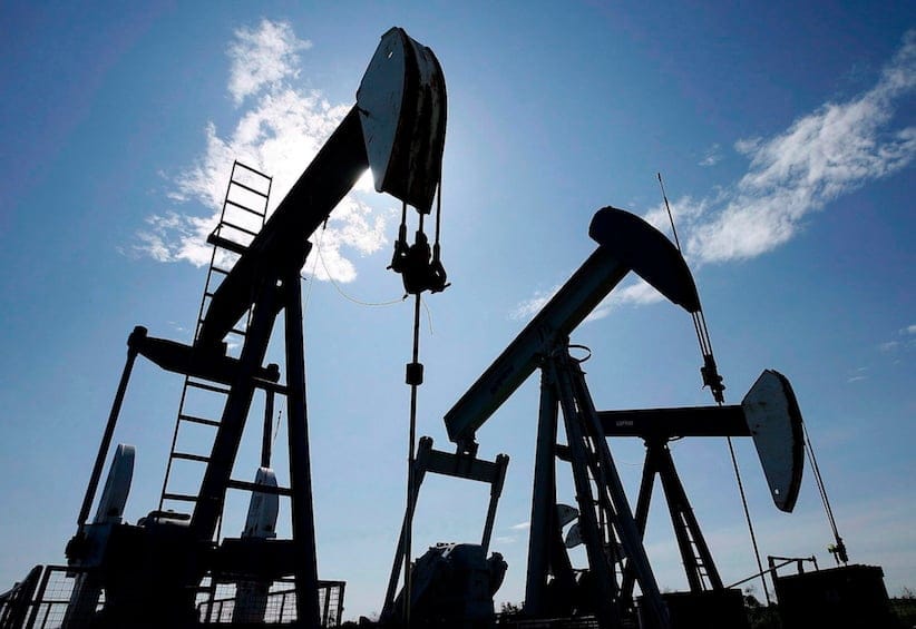 Pumpjacks at work pumping crude oil near Halkirk, Alta., June 20, 2007. With Canada's premiers poised to meet next week in Quebec City to discuss energy strategy and climate change, forces are girding for battle - with Alberta's oilsands the figurative no-man's land that lies between the warring world views. THE CANADIAN PRESS/Larry MacDougal