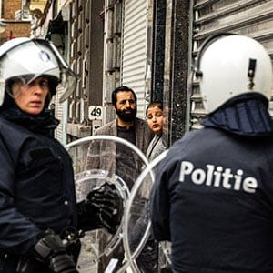 Daily Life In Brussels After Terror Attacks. Police confront residents of the Muslim district Molenbeek after a police investigation sparked anger between residents and police. Photograph by Timothy Fadek/Redux