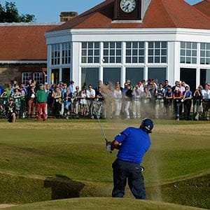 Angel Cabrera of Argentina hits out of a bunker on the 18th hole during the third round of the British Open golf Championship at Muirfield in Scotland July 20, 2013. (Russell Cheyne/Reuters)
