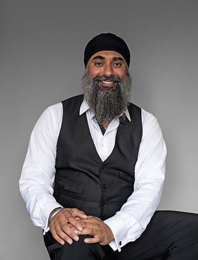 Crime-fiction writer Ranj Dhaliwal, at his home in Surrey, BC on August 2, 2015. Part of the Maclean's 110 project. (Photograph by Jimmy Jeong)