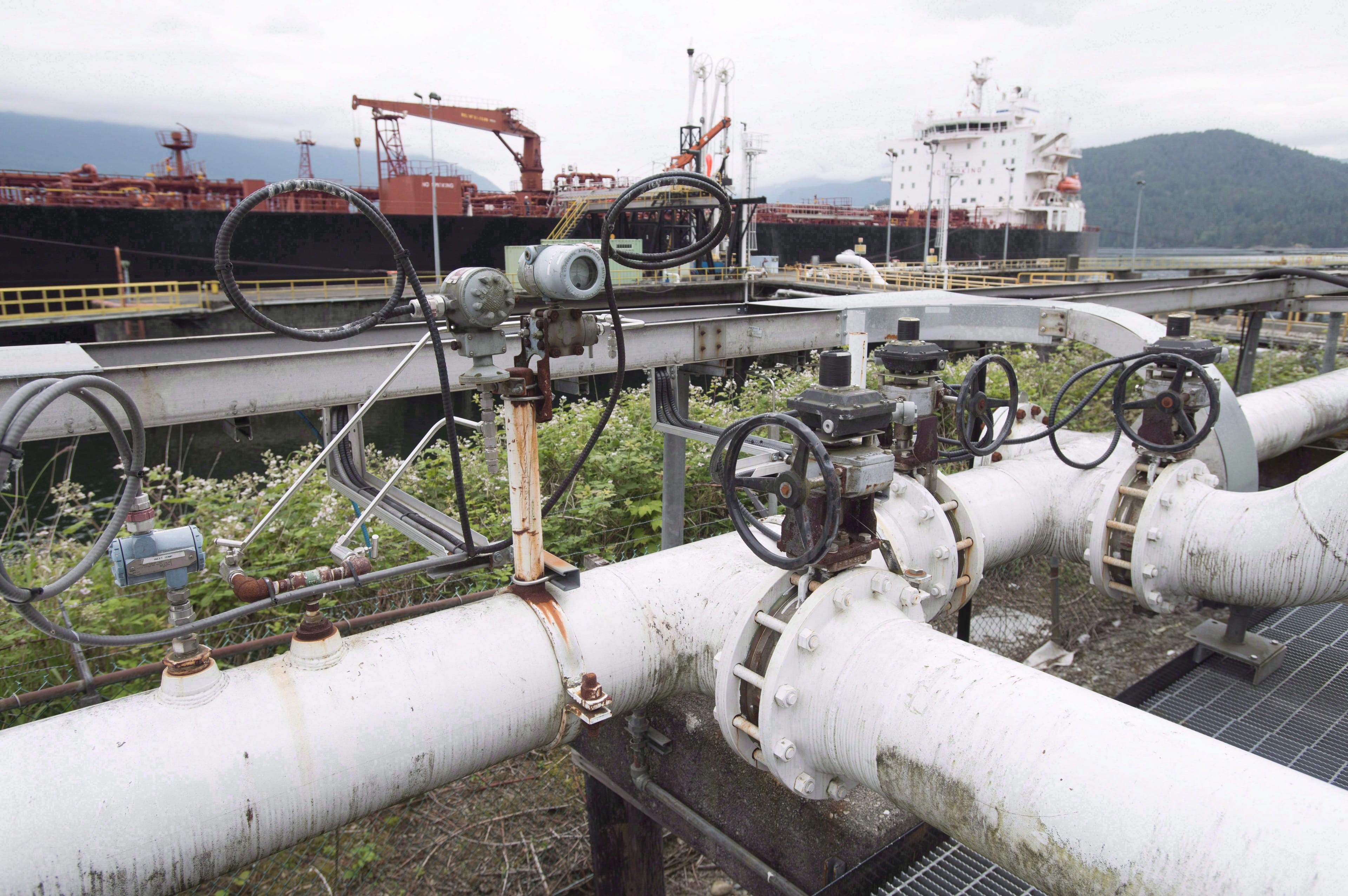 A ship receives its load of oil from the Kinder Morgan Trans Mountain Expansion Project's Westeridge loading dock in Burnaby, British Columbia, on June 4, 2015. The British Columbia government's final submission to the National Energy Board says it is unable to support Kinder Morgan's proposed pipeline expansion from Alberta to the West Coast.B.C. THE CANADIAN PRESS/Jonathan Hayward