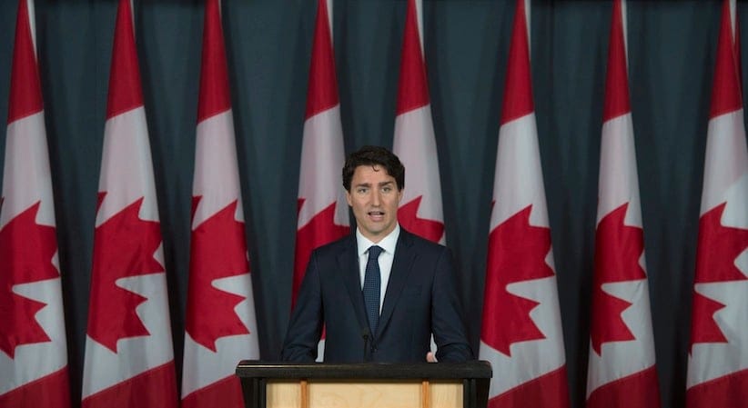 Prime Minister Justin Trudeau speaks with reporters as he takes part in a news conference to mark the end of the parliamentary session Wednesday June 22, 2016 in Ottawa. THE CANADIAN PRESS/Adrian Wyld