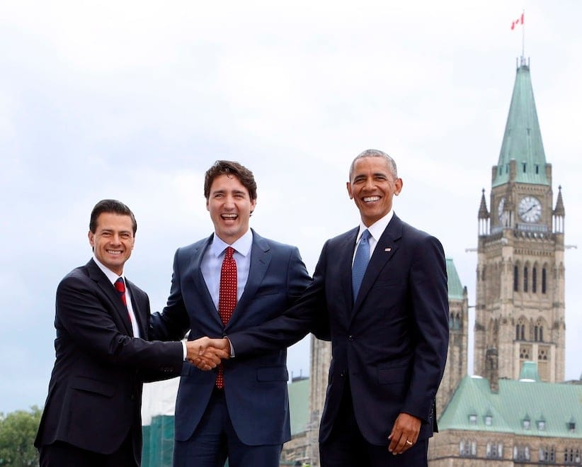 Prime Minister Justin Trudeau (centre), Mexican President Enrique Pena Nieto(left) and U.S. President Barack Obama(right) take part in a family photo at the North American Leaders' Summit in Ottawa, Wednesday June 29, 2016. (Fred Chartrand/CP)