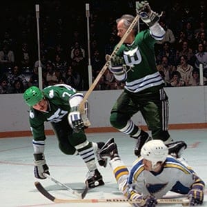 Gordie Roberts (left) and Gordie Howe (centre).  (Hockey Hall of Fame)