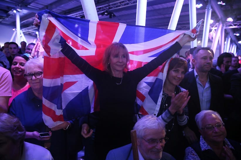 A Brexit supporter holds a Union Flag at a Vote Leave rally in London, Britain June 4, 2016. (Neil Hall/Reuters)