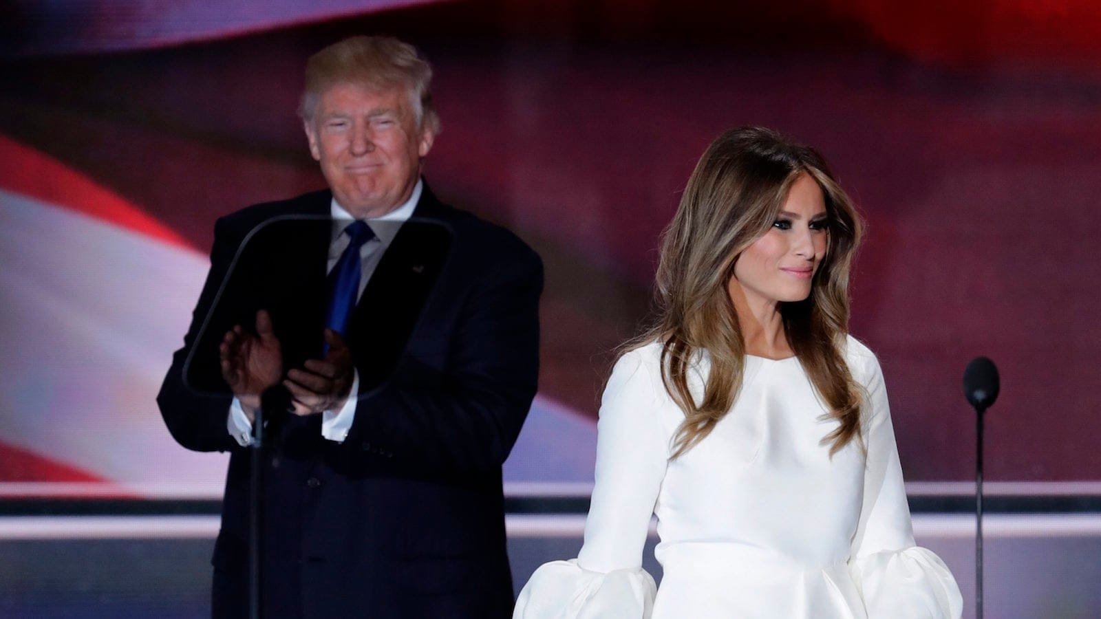 Melania Trump, wife of Republican Presidential Candidate Donald Trump walks to the stage as Donald Trump applaudss during the opening day of the Republican National Convention in Cleveland, Monday, July 18, 2016. (AP Photo/J. Scott Applewhite)