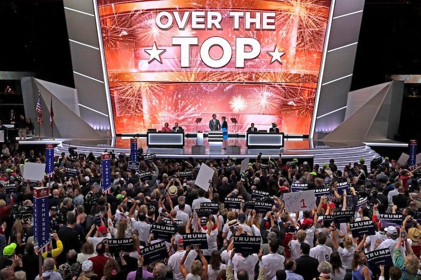 The large television monitor announces that after the New York delegation casts their votes that Donald Trump has enough votes to become the nominee of the Republican Party for President of the United States during the second day of the Republican National Convention in Cleveland, Tuesday, July 19, 2016. (AP Photo/J. Scott Applewhite)
