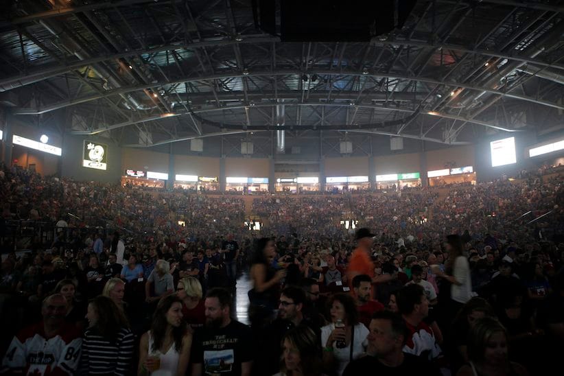 Fans sit ready for Tragically Hip's Gord Downie, during the first stop of the Man Machine Poem Tour at the Save-On-Foods Memorial Centre in Victoria, B.C., Friday, July 22, 2016. THE CANADIAN PRESS/Chad Hipolito