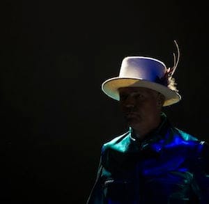 Frontman of the Tragically Hip, Gord Downie pauses for a moment at the start of a concert in Vancouver, Sunday, July, 24, 2016. THE CANADIAN PRESS/Jonathan Hayward