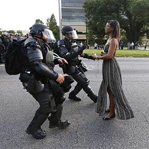 A demonstrator protesting the shooting death of Alton Sterling is detained by law enforcement near the headquarters of the Baton Rouge Police Department in Baton Rouge, Louisiana, U.S. July 9, 2016. (Jonathan Bachman/Reuters)