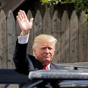Republican U.S. presidential candidate Donald Trump waves after meeting with House Republican members in Washington, U.S., July 7, 2016.  (Joshua Roberts/Reuters)
