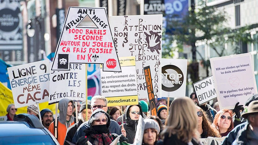 Protesters demonstrate against the Energy East and Line 9B Pipelines during a rally in Montreal, Saturday, October 10, 2015. (Graham Hughes/CP)