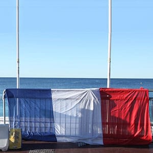 People react at the scene of a terror attack on the Promenade des Anglais on July 15, 2016 in Nice, France. A French-Tunisian attacker killed 84 people as he drove a lorry through crowds, gathered to watch a firework display during Bastille Day celebrations. The attacker then opened fire on people in the crowd before being shot dead by police.(Patrick Aventurier/Getty Images)