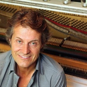 Jim Cuddy poses for a photo during an interview with The Canadian Press in Toronto on Friday September 23, 2011. On the title track of his new solo album, "Skyscraper Soul," Cuddy croons about a city that "can bring you down" but one which he cannot leave. The benevolent Blue Rodeo frontman says the reflective tune is largely an ode to his home and native city of Toronto, which he thinks is sometimes misunderstood. THE CANADIAN PRESS/Frank Gunn
