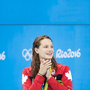 Canada's Penny Oleksiak shows her appreciation after winning a silver medal in the women's 100m butterfly at the 2016 Summer Olympic in Rio de Janeiro, Brazil. (Lucas Oleniuk/Toronto Star/Getty Images)