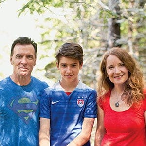 Quinn with his mother and father in Wakefield, Quebec August 17, 2016. (Photograph by Blair Gable)