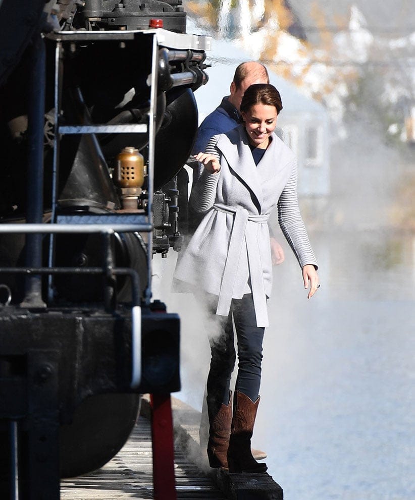 The Duke and Duchess of Cambridge walks beside a steam train in Carcross, Yukon, Canada, on the fifth day of the Royal Tour to Canada. (Dominic Lipinski/PA)