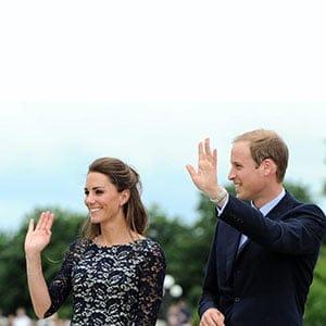 The Duke and the Duchess of Cambridge wave to the crowds as they take part in a ceremony at the National War Memorial  in Ottawa on Thursday, June 30, 2011. THE CANADIAN PRESS/Sean Kilpatrick