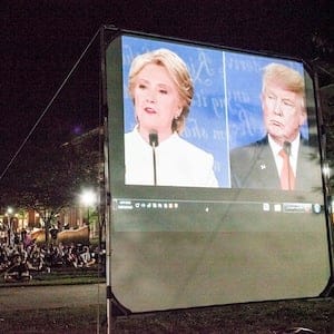 Students gather to watch the third and final presidential debate between Democrat Hillary Clinton and Republican Donald Trump on a screen at Western Kentucky University in Bowling Green, Ky., Wednesday, Oct. 19, 2016. (Austin Anthony/Daily News via AP)