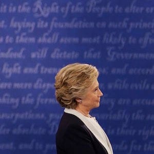 Democratic presidential nominee Hillary Clinton listens to Republican presidential nominee Donald Trump during the second presidential debate at Washington University in St. Louis, Sunday, Oct. 9, 2016. (AP Photo/John Locher)