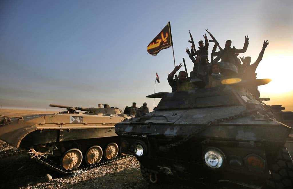 Iraqi forces deploy in the area of al-Shourah, some 45 kms south of Mosul, as they advance towards the city to retake it from the Islamic State (IS) group jihadists, on October 17, 2016.
Iraqi Prime Minister Haider al-Abadi announced earlier in the day that the long-awaited operation to recapture Mosul was under way. (Ahmad Al-Rubaye/AFP/Getty Images)